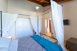 Agriturismo - La Campagna di San Francesco客房内的一张或多张床位