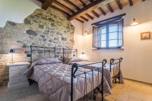Agriturismo - La Campagna di San Francesco客房内的一张或多张床位