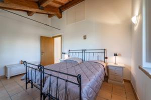 Agriturismo - La Campagna di San Francesco客房内的一张或多张床位