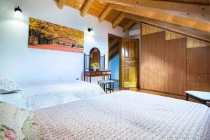 Postel nebo postele na pokoji v ubytování 1841 Petrino Villa