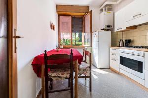Kuchyňa alebo kuchynka v ubytovaní Luminoso appartamento