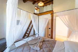 Agriturismo - La Campagna di San Francesco客房内的一张或多张床位