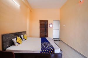 Katil atau katil-katil dalam bilik di SPOT ON Hotel Pragya 5