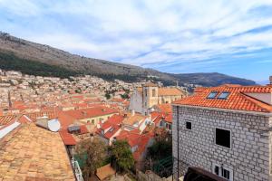 a view of a town with red roofs at City Walls Hostel in Dubrovnik