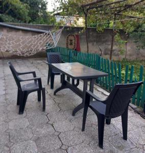 two chairs and a table and a table and two chairs at Guli in Gori