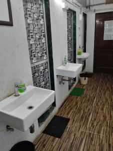 Koupelna v ubytování Bapuji Dormitory Hostel Mumbai