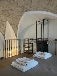 Ένα ή περισσότερα κρεβάτια σε δωμάτιο στο Dimora Lucrezia - B