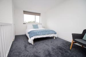 Tempat tidur dalam kamar di One Bedroom Apartment | Smart TV and WiFi