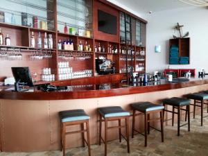 Ο χώρος του lounge ή του μπαρ στο Hotel Poseidon