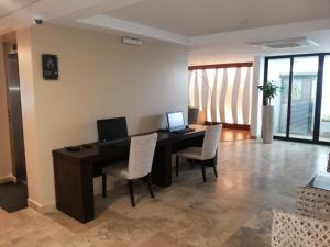 Χώρος καθιστικού στο Hotel Poseidon