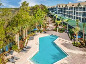 - une vue aérienne sur la piscine du complexe dans l'établissement Pet-Friendly 3BR Condo w Pool Hot Tub, à Orlando