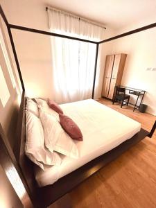 Postel nebo postele na pokoji v ubytování Fiera Maison