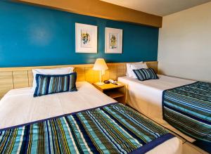 Postel nebo postele na pokoji v ubytování Hotel Reymar Express