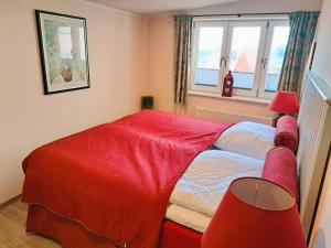 Ένα ή περισσότερα κρεβάτια σε δωμάτιο στο Haus am Meer Strandgeflüster