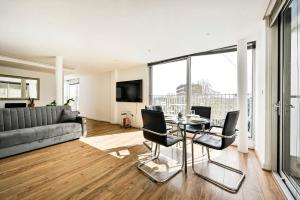 O zonă de relaxare la That Cosy Stay - Exclusive Roof Top Apartment - Stratford
