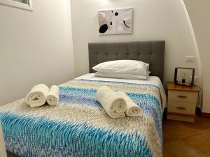 Postel nebo postele na pokoji v ubytování Sperlonga Paradise Central Loft