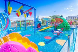 a playground with a water park with a slide at Hotel Altamarea Cesenatico in Cesenatico