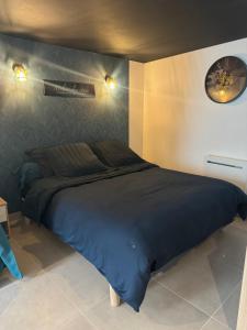 Postel nebo postele na pokoji v ubytování Suite L'échappée Belle