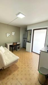 REST APARTMENT IN THE POBLADO客房内的一张或多张床位