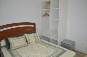 Ένα ή περισσότερα κρεβάτια σε δωμάτιο στο Apartamento TERRAS VELLAS