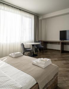 Letto o letti in una camera di Eclipse Winery Boutique Hotel