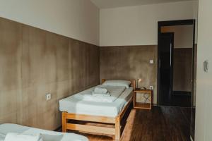 En eller flere senge i et værelse på 3-Zimmer-Oase-Cityapartment Bielefeld Mitte 301