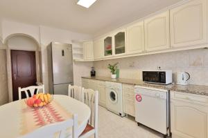 Køkken eller tekøkken på Casa Sol Nascente + 32 billeder