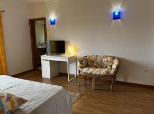 Et tv og/eller underholdning på Areal da Ria