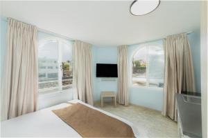 Villa Li Eilat的电视和/或娱乐中心