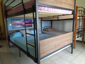 a couple of bunk beds in a room at Thalassa in Panayía +40 photos