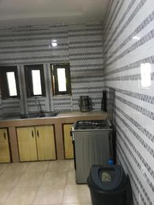 Η κουζίνα ή μικρή κουζίνα στο Grace Apartment
