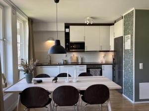 Kuchyň nebo kuchyňský kout v ubytování Kungsberget Åhus C2, Semesterboende & Lägenhet + 4 fotografie