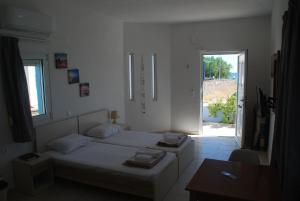 Postel nebo postele na pokoji v ubytování Soula appartments