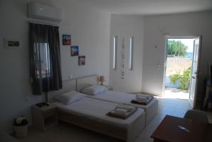 Postel nebo postele na pokoji v ubytování Soula appartments
