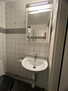 Et badeværelse på Home Inn KG26