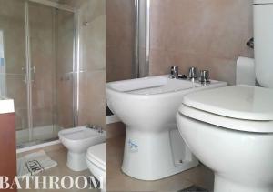 a bathroom with a toilet and a sink and a shower at DEPARTAMENTO FRANCIA centrico 1 dor in Comodoro Rivadavia