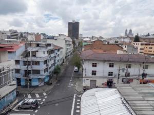 an overhead view of a city street with buildings at Hotel El Ejido in Quito