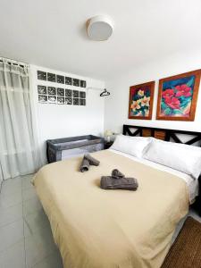 Voodi või voodid majutusasutuse Casa Jardin del Mar toas