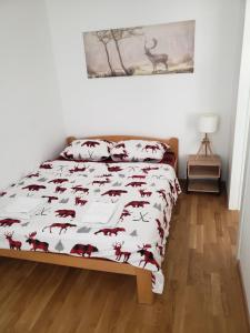 Postel nebo postele na pokoji v ubytování Divčinova B15