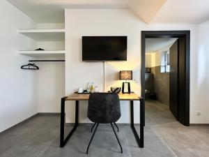 TV a/nebo společenská místnost v ubytování Si-View Doppelzimmer Zimmer 14