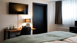 Postel nebo postele na pokoji v ubytování Si-View Doppelzimmer Zimmer 14 - Hotel