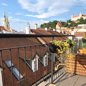 a balcony with a view of a city at Apartments Bastova, Stela & Mia Apartments in Bratislava