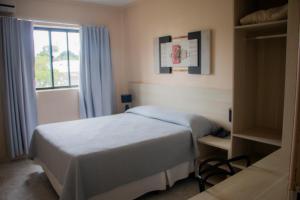 Postel nebo postele na pokoji v ubytování Hotel Novoleste