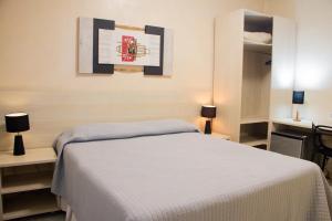 Postel nebo postele na pokoji v ubytování Hotel Novoleste