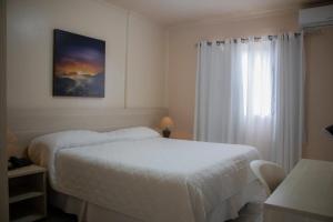 Postel nebo postele na pokoji v ubytování Hotel Novoleste