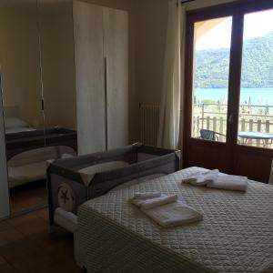 Ένα ή περισσότερα κρεβάτια σε δωμάτιο στο Residenza Margherita