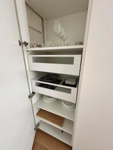 Palanda nebo palandy na pokoji v ubytování Palazzo Metropolis