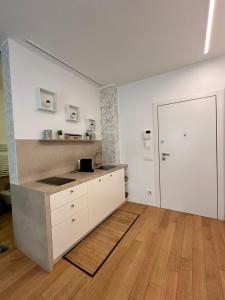 Kuchyň nebo kuchyňský kout v ubytování Palazzo Metropolis