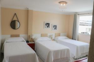 Postel nebo postele na pokoji v ubytování Hotel Novoleste