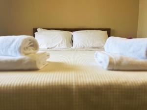 Postel nebo postele na pokoji v ubytování Agnanti Zitsas Hotel